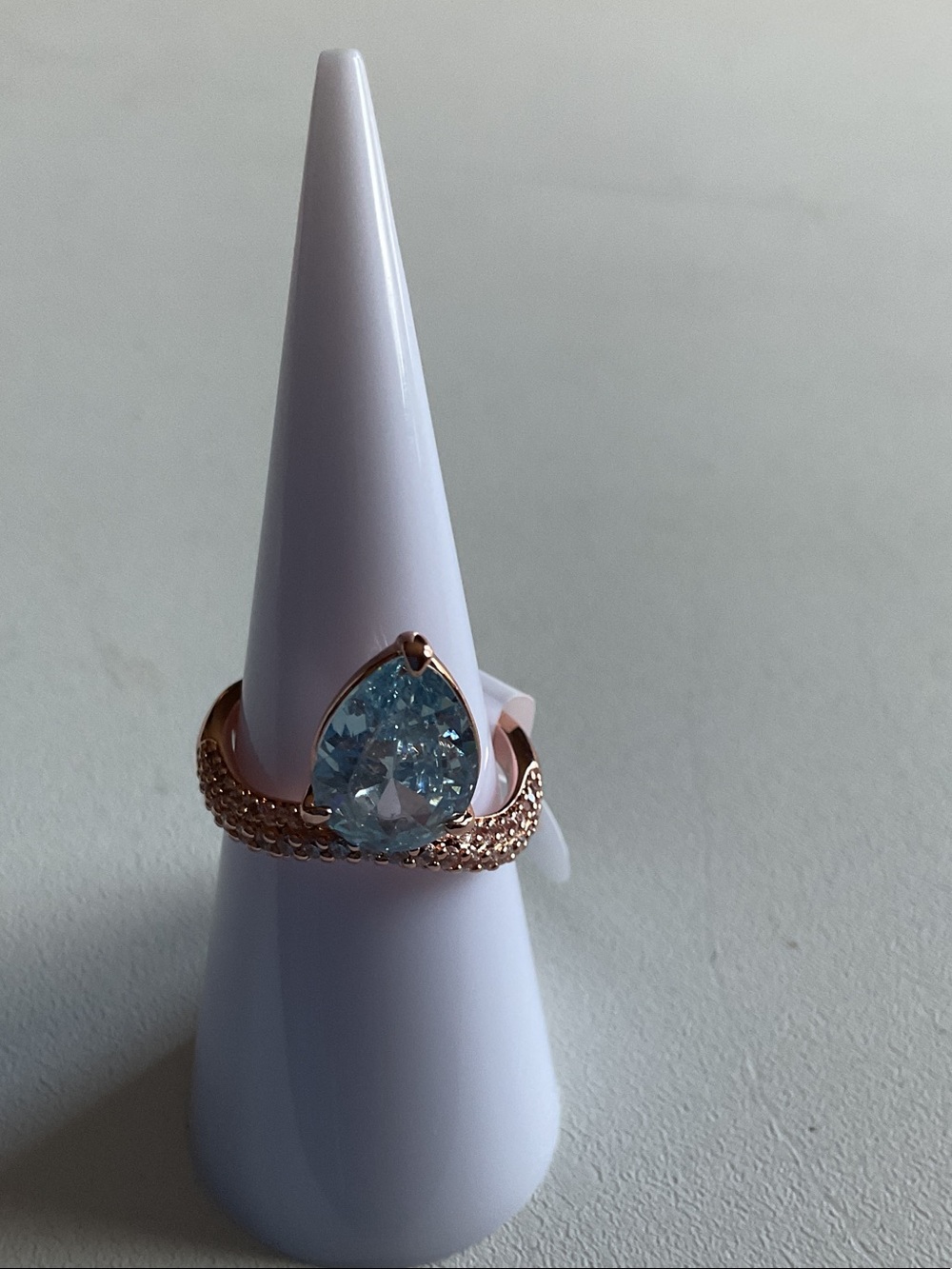 bp Rose Gold Ring with Teardrop Light Blue Stone